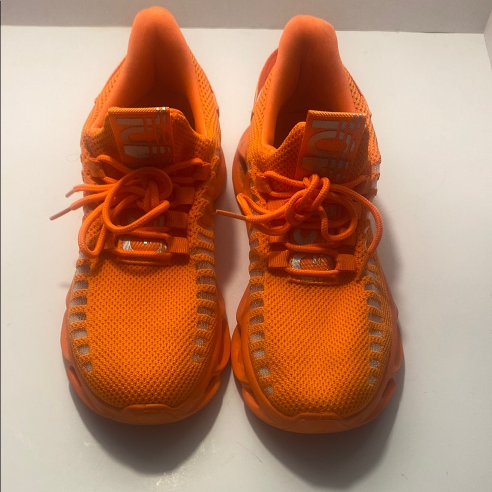Woman’s Orange Athletic Shoes